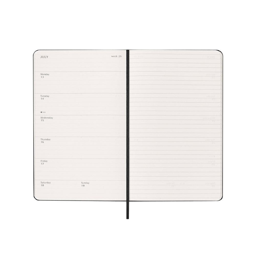 Open planner with daily layout on the left and lined pages on the right.