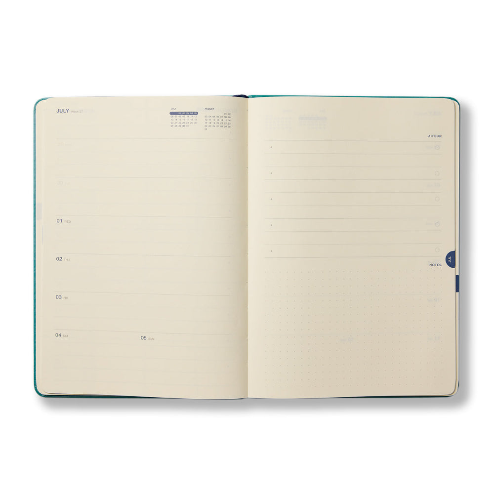 Open planner with horizontal weekly layout with a note section on a white background