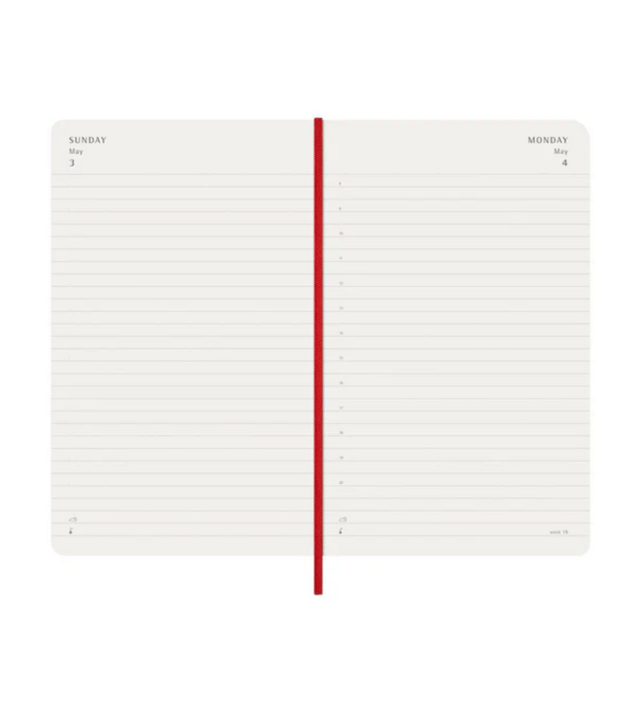 White lined planner with a red ribbon